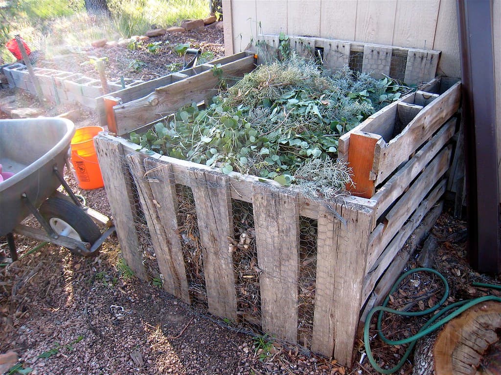 A compost heap at capacity, turned and working.